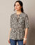 Blouse à nouettes, imprimé peau de bête (écru / taupe)