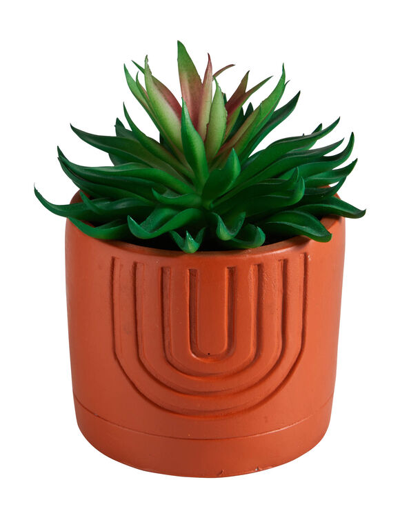Plante verte artificielle et pot en ciment (terracotta)