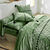 Linge de lit Massaï coton à motifs graphiques et finitions pompons (vert olive)
