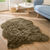Tapis poils forme peau de b&ecirc;te (taupe)