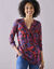 Tunique col boutonné imprimé floral (rouge / violet)