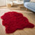 Tapis poils forme peau de b&ecirc;te (rouge)