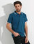 Polo uni maille piquée manches courtes (bleu canard)