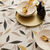 Nappe toile cir&eacute;e imprim&eacute; v&eacute;g&eacute;tal (beige / noir)