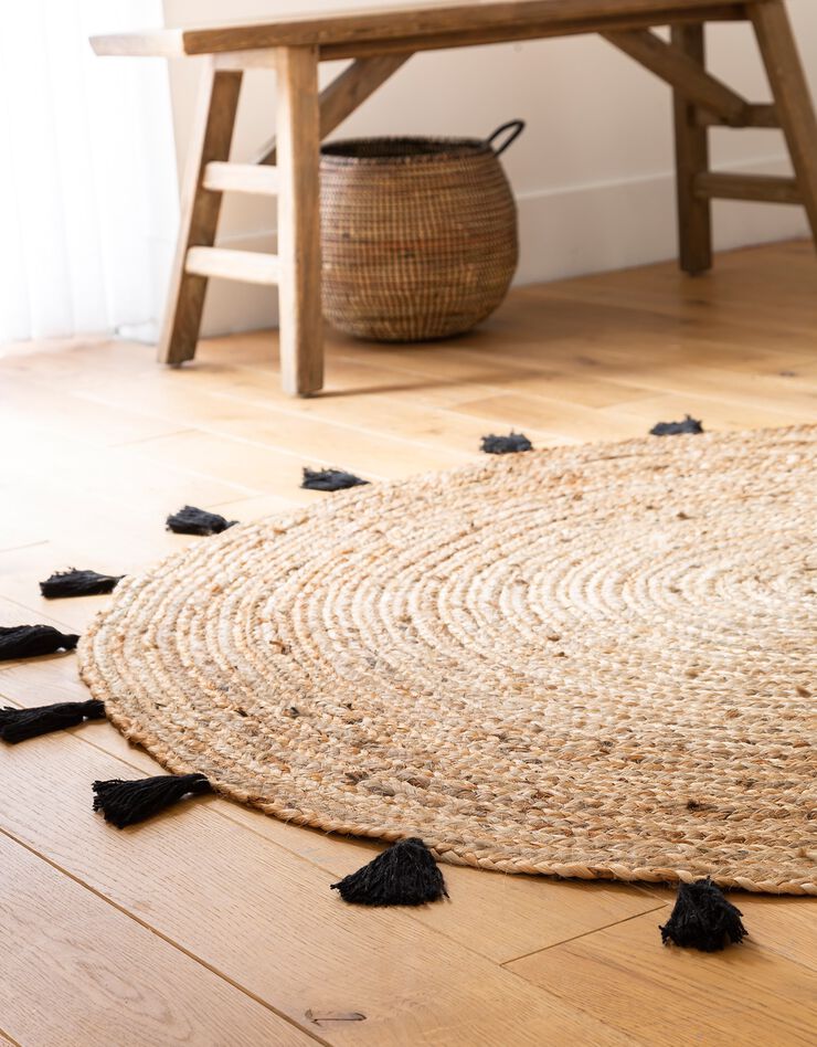 Tapis rond en jute avec pompons de couleur (noir)