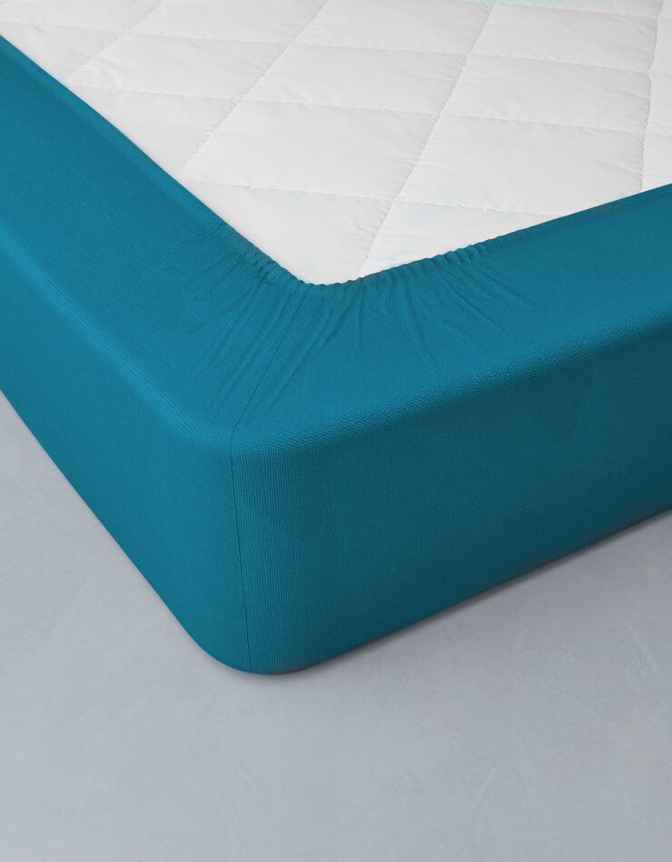 Drap-housse uni flanelle bonnets 32 cm (bleu paon)