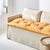 Long coussin d&eacute;co imprim&eacute; feuillage (miel)