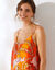 Robe longue imprimée col V fines bretelles (terracotta / melon)