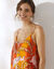 Robe longue imprimée col V fines bretelles (terracotta / melon)