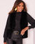 Veste sans manches en fausse fourrure  (noir)