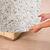 Housse bi-extensible microfibre effet faux uni pour fauteuil et canapé (beige)