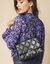 Sac matelassé, aspect cuir** (noir)