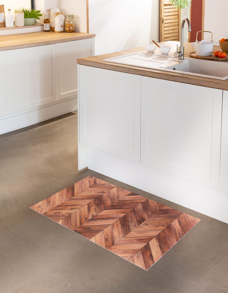 Tapis vinyle effet parquet chevrons (marron) Tapis vinyle effet parquet chevrons (marron)