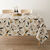 Nappe toile cir&eacute;e imprim&eacute; v&eacute;g&eacute;tal (beige / noir)