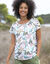 T-shirt col rond imprimé tropical (blanc / kaki)