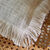 Coussin uni coton texturé (ivoire)
