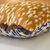Coussin double face imprimé ethnique (beige / caramel)