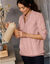 Pull col montant zippé, maille torsadée (rose poudré)