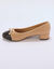 Ballerines bicolores &agrave; talon (&eacute;cru / noir)