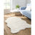 Tapis poils forme peau de bête (naturel)