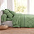 Linge de lit Massaï coton à motifs graphiques et finitions pompons (vert olive)
