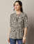 Blouse à nouettes, imprimé peau de bête (écru / taupe)