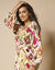 Robe longue col V imprimée (beige / multicolore)