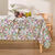 Nappe anti-taches imprimé petites fleurs (blanc / parme)