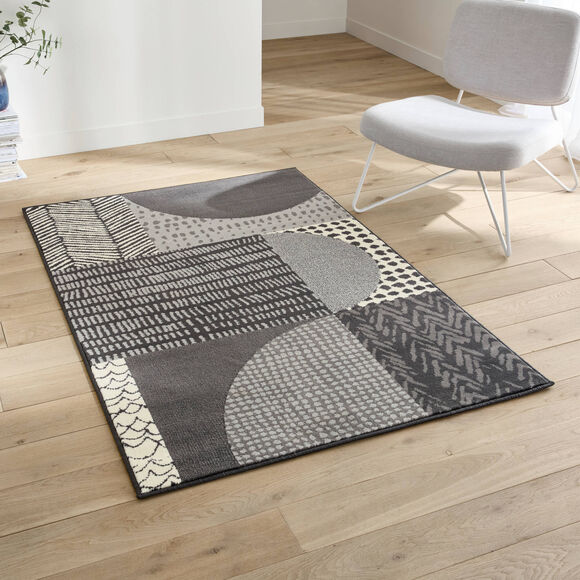 Tapis d&eacute;coratif motif g&eacute;om&eacute;trique (gris fonc&eacute;)