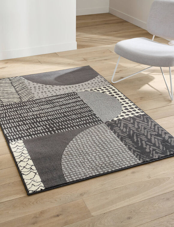 Tapis d&eacute;coratif motif g&eacute;om&eacute;trique (gris fonc&eacute;)