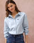 Chemise ample unie brod&eacute;e (bleu clair)