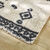 Tapis style berbère (écru / noir)