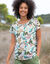 T-shirt col rond imprimé tropical (blanc / kaki)