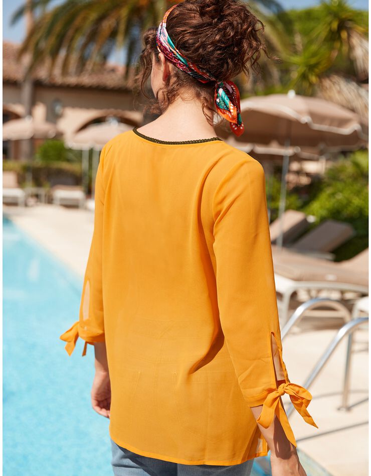 Blouse évasée voile uni manches nouées (mangue) Blouse évasée voile uni manches nouées (mangue)