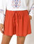 Short cr&eacute;pon uni, effet jupette (paprika)