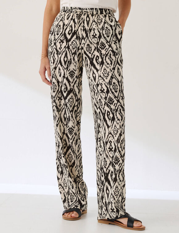 Pantalon fluide imprim&eacute; (&eacute;cru / noir)