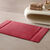Tapis de bain &eacute;ponge liteau reli&eacute;f&eacute; confort premium (grenat)