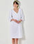 Robe courte évasée, détails broderie anglaise (blanc)