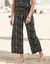 Pantalon large 7/8ème, taille élastiquée, maille imprimée (noir / écru)