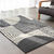 Tapis décoratif motif géométrique (gris foncé)