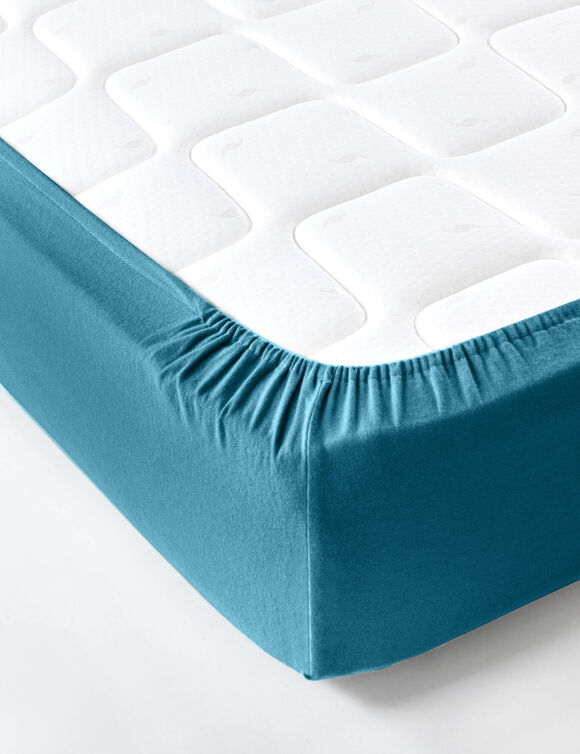 Drap-housse uni flanelle bonnets 32 cm (bleu paon)