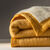 Couverture bicolore pure laine 600 g/m² (miel)