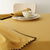 Nappe unie coton finition fantaisie (miel)