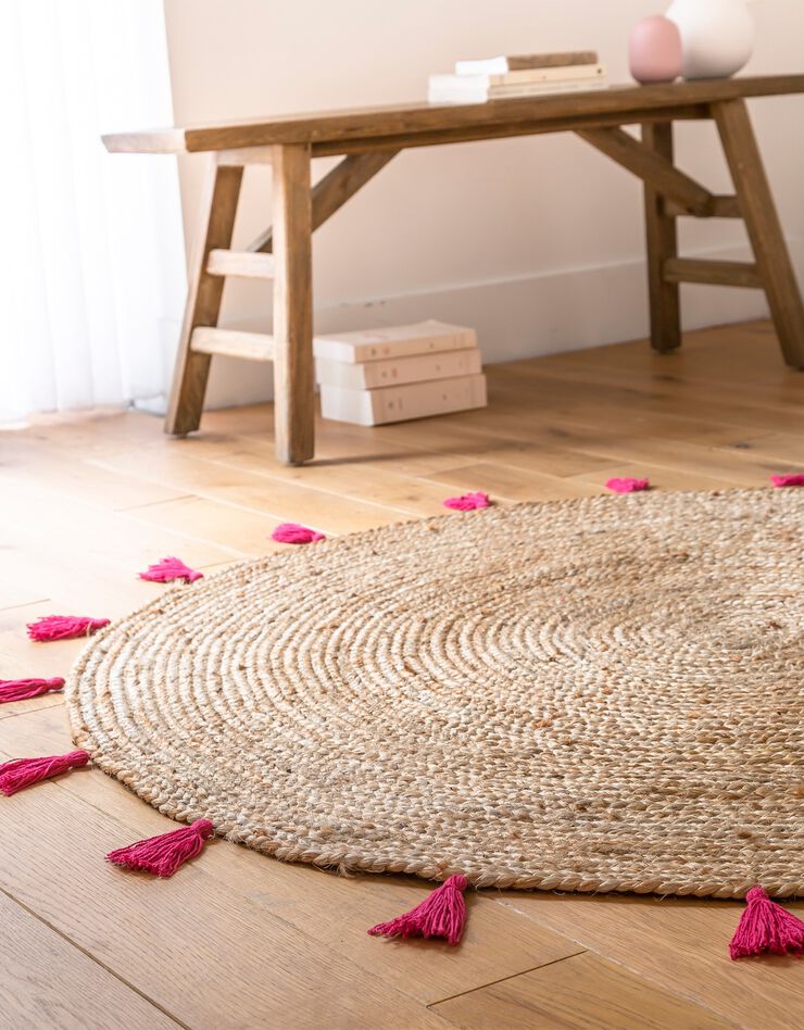 Tapis rond en jute avec pompons de couleur (framboise)