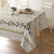 Nappe toile cirée imprimé feuilles et chemin de table (taupe / blanc)