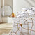 Linge de lit Geoffroy en coton à motifs graphiques (blanc)
