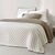 Couvre-lit réversible microfibre matelassée/sherpa (beige)