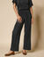 Pantalon large uni, maille plissée (noir)
