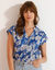 Chemisier manches courtes col volanté, imprimé floral (bleu)