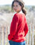 Pull  col V maille anglaise ajourée (rouge)